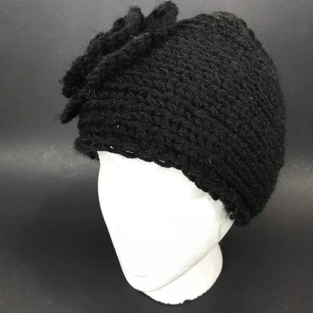 Wool blend black hand knit headband with flower accent